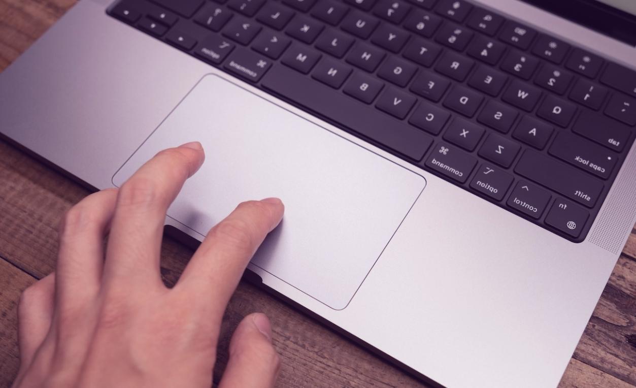 Professional workspace with learning materials and digital tools